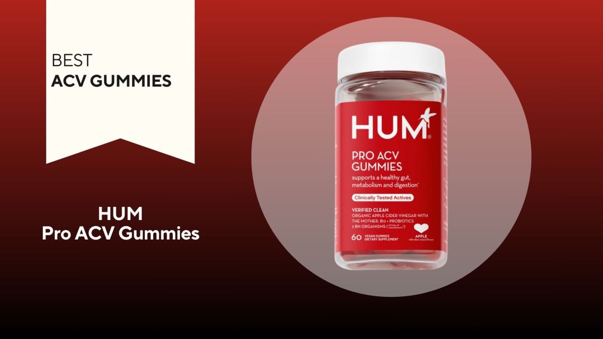 Clear bottle with red label that says "HUM Pro ACV Gummies" in white writing, against a red background